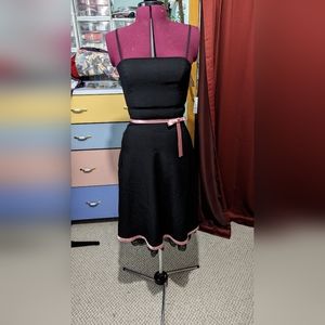 Black spaghetti strap dress with pink accent